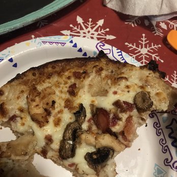 Domino's Pizza - a slice of pizza on a paper plate - Pizza Near Me - Ammon, Idaho