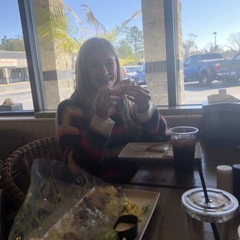 Olea Mediterranean Kitchen - Emme enjoying pizza.. yes, they have delicious pizza! - Mediterranean Near Me - Swansboro, North Carolina Olea Mediterranean Kitchen - Emme enjoying pizza.. yes, they have delicious pizza! - Mediterranean Near Me - Swansboro, North Carolina