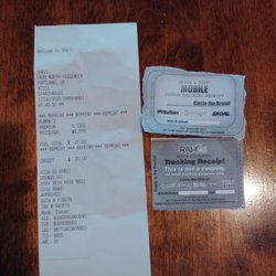 St John's Shell - Received this receipt that's not mine and tracking receipts that the gas attendant said were coupons for tobacco.