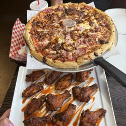 Pizza Inn - Large pizza and wings!