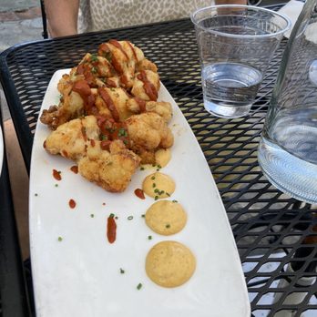 Zinnia - Sweet and spicy cauliflower with pepper jelly and hot honey. So good. - Cocktail Bars Near Me - Silver Spring, Maryland