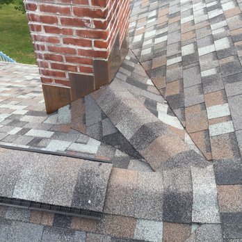 Brown Roofing - Cricket installed in the back of the chimney - Roofing Near Me - Seymour, Connecticut Brown Roofing - Cricket installed in the back of the chimney - Roofing Near Me - Seymour, Connecticut
