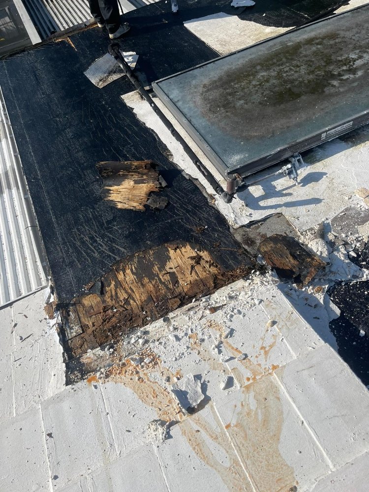 Slide of Escobar Roofing