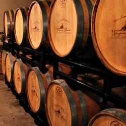 Whispering Meadows Vineyards & Winery - Barrels in the wine vault.
