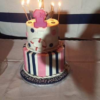 Chantilli Bakery - a birthday cake with candles - Bakeries Near Me - Dallas, Texas