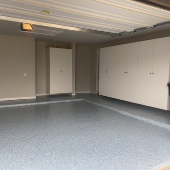Garage Experts - Garage floor and cabinets, patio with tarp to protect from weather - Flooring Near Me