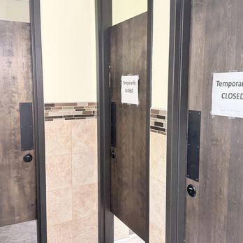 Hideaway Pizza - Two of the three women's restroom stalls were closed - Pizza Near Me - Plano, Texas