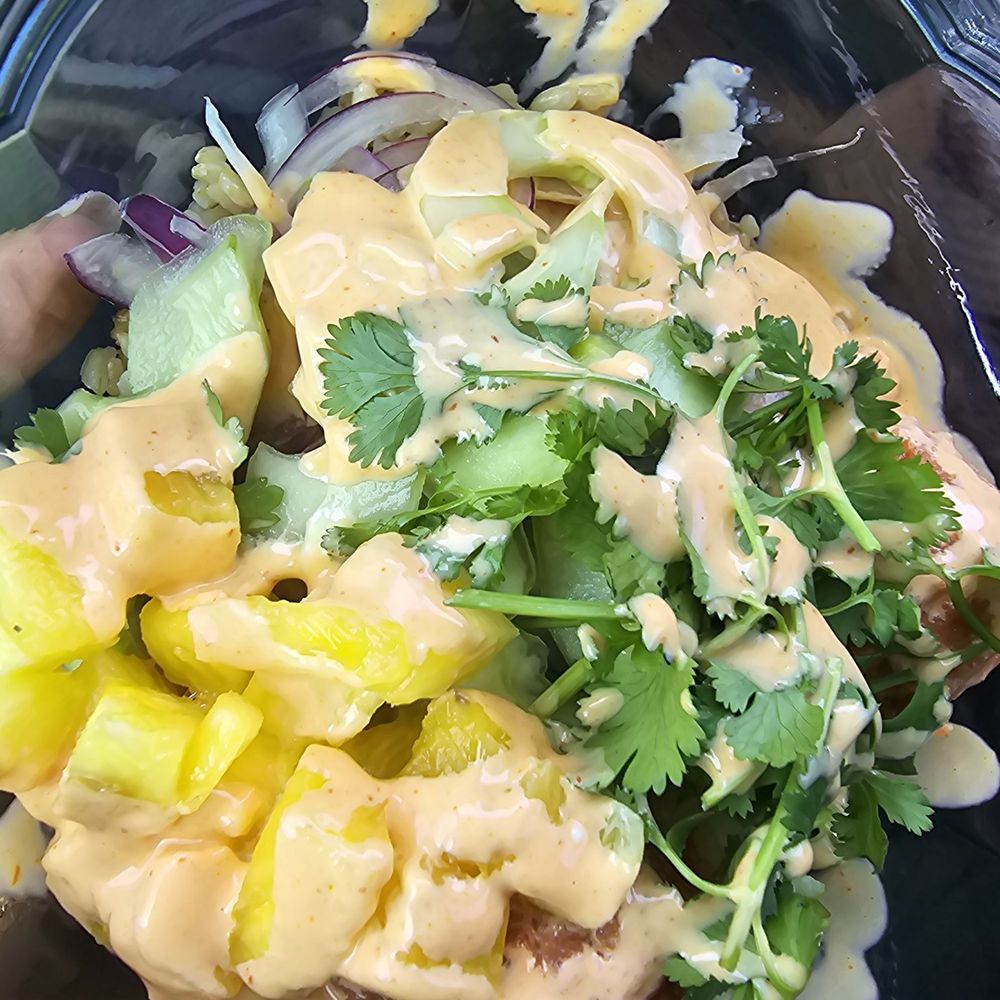Spicy tuna, brown rice, pineapple, cucumber etc with spicy mayo Spicy tuna, brown rice, pineapple, cucumber etc with spicy mayo
