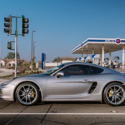 Tint My Ride - Porsche Cayman with yellow color changed calipers