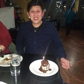 Tapas Valencia - Picture of my sister and a waiter wishing a happy birthday candle - Spanish Near Me - Chicago, Illinois Tapas Valencia - Picture of my sister and a waiter wishing a happy birthday candle - Spanish Near Me - Chicago, Illinois