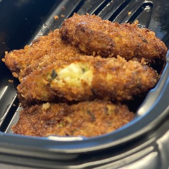 Elia Cafe & Mediterranean Products - Zuchinni Fritters crispy out side and gooey inside - Mediterranean Near Me - Miami, Florida Elia Cafe & Mediterranean Products - Zuchinni Fritters crispy out side and gooey inside - Mediterranean Near Me - Miami, Florida