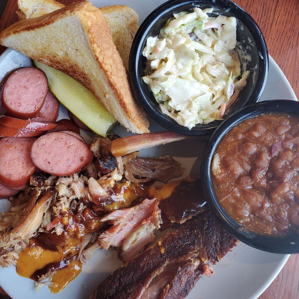 Dusty special with 3 meats and two sides dishes for about 13.00.  The ribs were fall off the bone tender