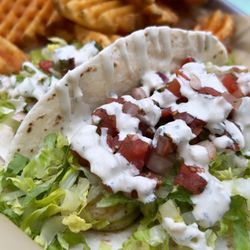 Zogg's Raw Bar & Grill - Shrimp tacos with waffle fries.