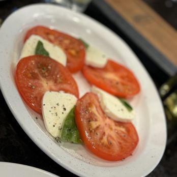 Grimaldi's Pizzeria - The expensive caprese. Not enough basil to complement the cheese and tomatoes. - Pizza Near Me - Ankeny, Iowa Grimaldi's Pizzeria - The expensive caprese. Not enough basil to complement the cheese and tomatoes. - Pizza Near Me - Ankeny, Iowa