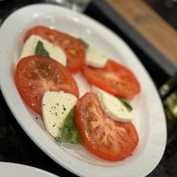 Grimaldi's Pizzeria - The expensive caprese. Not enough basil to complement the cheese and tomatoes.