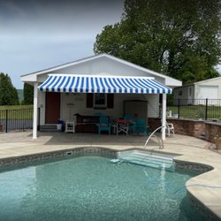 Shank Door - Retractable awning for pool area