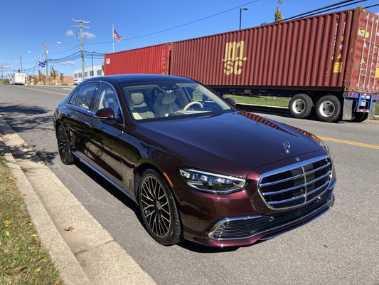 Executive Transport - A local auto company CEO sought our help to source a new flagship vehicle in which he could work from the back seat and also pick up his 14-mo-old daughter. He had been driving Audis for 15 years and wanted an S8 with an Executive Package.

We determined that there were none in the country with the rear-seat executive package and the color scheme he was looking for. We reached out to our local Audi contact to understand special order timelines, and it was going to be November before they could take 2022 orders, and he would be looking at a May delivery.

The client evaluated this - in addition to an article that we provided on the current-gem S class (https://www.roadandtrack.com/reviews/a37159449/2021-mercedes-s-class-review/)

Based on this input, the client decided to look for an S-Class thet might suit his needs. We located this stunning Rubelite Red example, with the rear seat executive package (1 of 1 in the country) and provided all of the details on its features and performance in comparison with the S8 he originally sought.

The client moved ahead, and we arranged for all paperwork and delivery to his place of business.