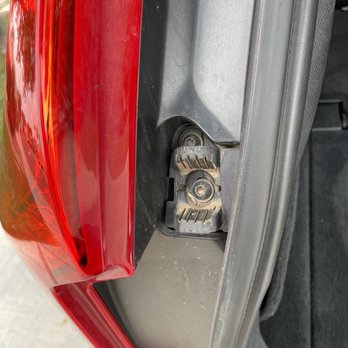 Chad’s Auto Spa - Dirt when lifting up the tailgate. - Auto Detailing Near Me