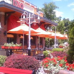 Uno Pizzeria & Grill - Come eat on our outside patio. The food is even better then the landscaping!