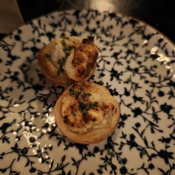 Josephine Carmel - Goat cheese and caramelized onion puff pastry amuse bouche - French Near Me - Carmel, Indiana