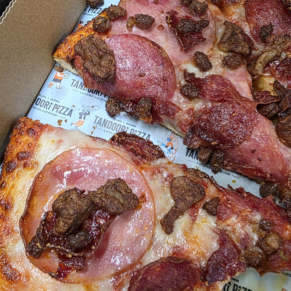 Ham on our Halal pizza. Canadian bacon is not halal. Ham on our Halal pizza. Canadian bacon is not halal.