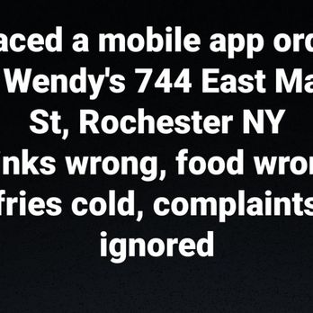 Wendy's - a black background with white text that reads, placed a mobile app holder to wendy's 74 east main st - Burgers Near Me - Rochester, New York Wendy's - a black background with white text that reads, placed a mobile app holder to wendy's 74 east main st - Burgers Near Me - Rochester, New York