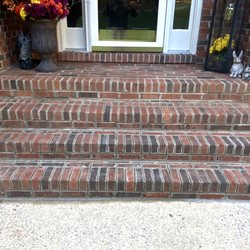 Taylor Made Masonry - AFTER:  Taylor ground out ALL the mortar from the landing down and tuck-pointed ALL the seams, giving it a uniform look.