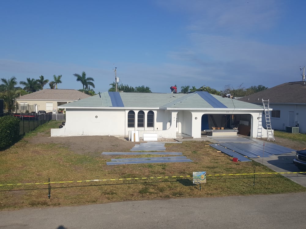 Slide of Champions Roofing