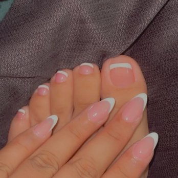 Adore Day Spa & Nails - picture of the first day I got the service done.in this photo is also one where you can see the toenail that the lady cut crooked. - Day Spas Near Me - Santa Ana, California Adore Day Spa & Nails - picture of the first day I got the service done.in this photo is also one where you can see the toenail that the lady cut crooked. - Day Spas Near Me - Santa Ana, California