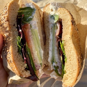Boichik Bagels - Everything bagel sandwich with garlic and artichoke schmear and all the veggies - Bagels Near Me - Berkeley, California Boichik Bagels - Everything bagel sandwich with garlic and artichoke schmear and all the veggies - Bagels Near Me - Berkeley, California