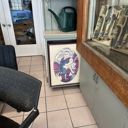Frogs and ...not sure what is on the framed drawing. Frogs and ...not sure what is on the framed drawing.