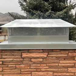 Troost Roofing - custom metal chimney caps