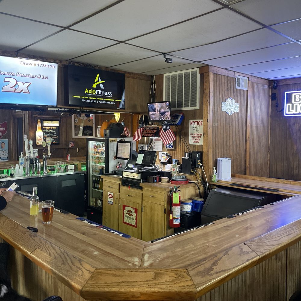 The Wagon Wheel Tavern - a bar with a wooden bar top - Bars Near Me - Leavittsburg, Ohio The Wagon Wheel Tavern - a bar with a wooden bar top - Bars Near Me - Leavittsburg, Ohio