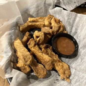Debbie's Sportsmans Lounge - Pork bites - Bars Near Me - Baldwin, Michigan