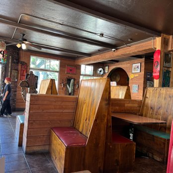 Pokez - the inside of a restaurant with booths and tables - Mexican Near Me - San Diego, California Pokez - the inside of a restaurant with booths and tables - Mexican Near Me - San Diego, California
