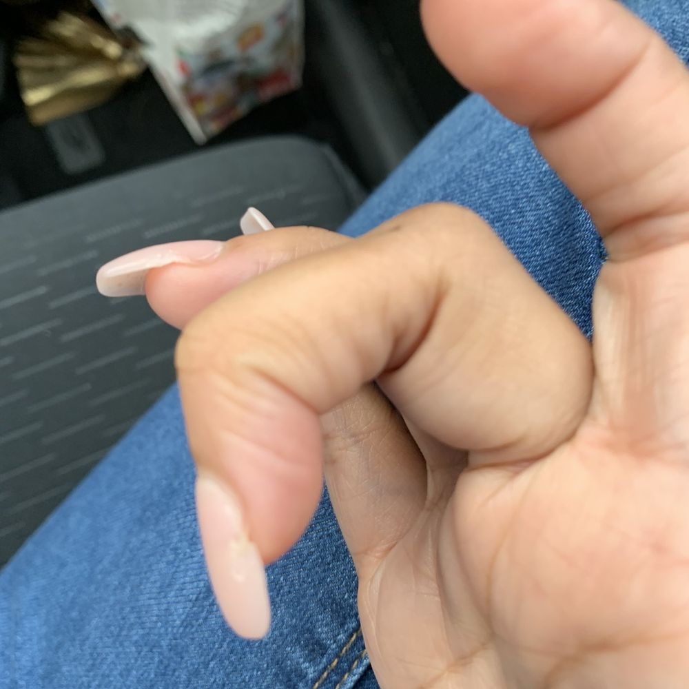 Divine Nails & Spa - This is the nail I asked them to fix. I noticed it wasn't glued on right, even before acrylic was applied, and they said it was fine. - Nail Salons Near Me - Katy, Texas Divine Nails & Spa - This is the nail I asked them to fix. I noticed it wasn't glued on right, even before acrylic was applied, and they said it was fine. - Nail Salons Near Me - Katy, Texas