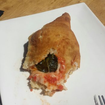 Osteria Papavero - Interior of fried calzone. Restaurant Week Summer 2019. Good flavor, as others have said small portions. - Italian Near Me - Madison, Wisconsin Osteria Papavero - Interior of fried calzone. Restaurant Week Summer 2019. Good flavor, as others have said small portions. - Italian Near Me - Madison, Wisconsin
