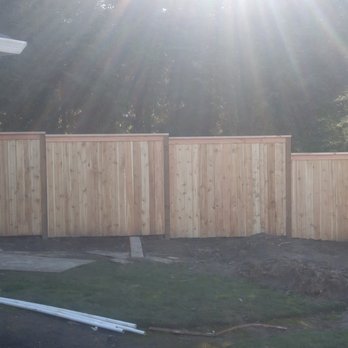 Built Stout Fence & Deck - View of "stepped" side fence - Fences & Gates Near Me