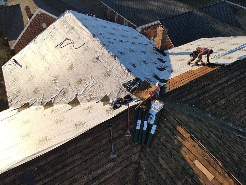 Slide of Roof and Restoration Experts