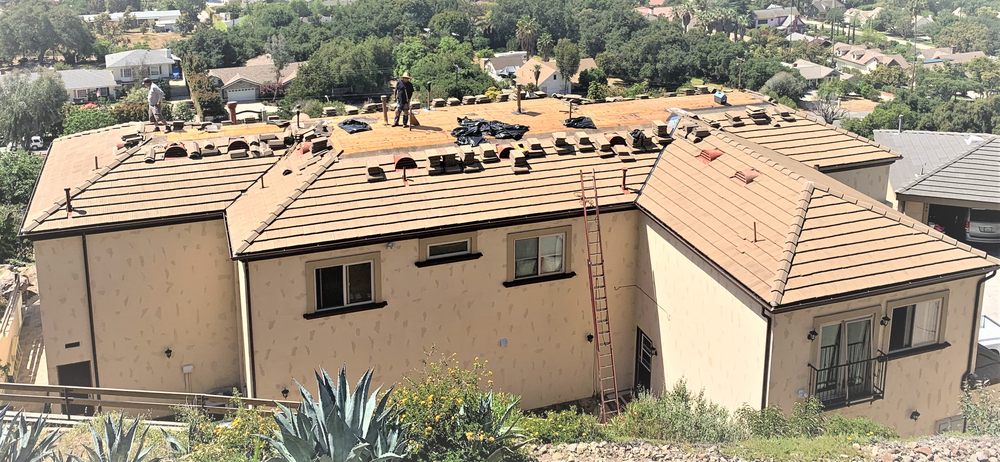 Slide of Advanced Roofing & Sons