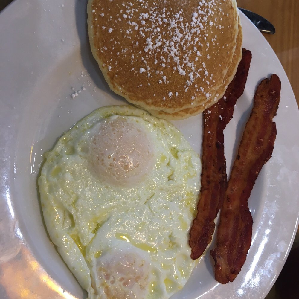 Eggcetera Breakfast & Lunch - 2 + 2 + 2: two Eggs over easy, two bacon, two pancakes. $5.95 - Breakfast & Brunch Near Me - Fort Myers, Florida