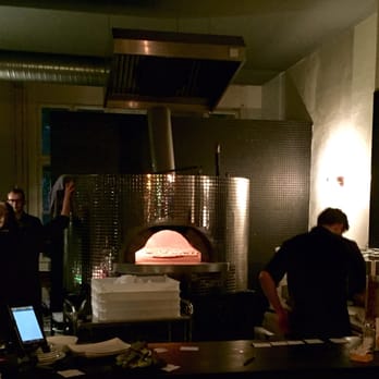 Monella - The view into the kitchen while sitting at the bar - great oven, greater chef! - Gastropubs Near Me - Berlin, BE Monella - The view into the kitchen while sitting at the bar - great oven, greater chef! - Gastropubs Near Me - Berlin, BE