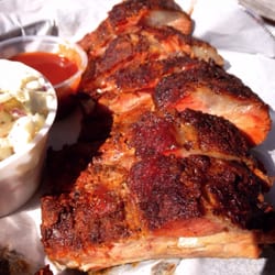 Low and slow smoked ribs that literally fall of the bone... Best ribs I've had in all of Florida!