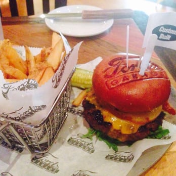 Ford's Garage - My friends burger. Don't let the picture fool you! Burger hot as fire, fries were cold as ice! - Burgers Near Me - Brandon, Florida