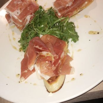 Bon Appetit - Grilled baguette with prosciutto, marscapone, onion jam, arugula and truffle honey. Delicious!! - New American Near Me - Dunedin, Florida Bon Appetit - Grilled baguette with prosciutto, marscapone, onion jam, arugula and truffle honey. Delicious!! - New American Near Me - Dunedin, Florida