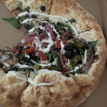 MOD Pizza - Customized 11" thick crust vegetarian with too much crust and toppings gathered in center of pizza. - Fast Food Near Me - Tucson, Arizona MOD Pizza - Customized 11" thick crust vegetarian with too much crust and toppings gathered in center of pizza. - Fast Food Near Me - Tucson, Arizona