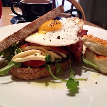 Lantana - BERT - Toasted sourdough, organic streaky bacon, a fried egg, rocket, fresh tomato and aioli - Breakfast & Brunch Near Me - London, XGL Lantana - BERT - Toasted sourdough, organic streaky bacon, a fried egg, rocket, fresh tomato and aioli - Breakfast & Brunch Near Me - London, XGL