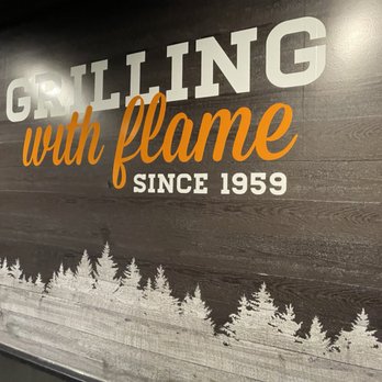 Harvey's - a sign for cutting with flame since 1939 - Fast Food Near Me - Toronto, Ontario