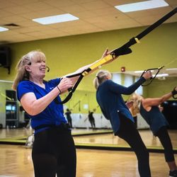 Capital City Health Club - Long time instructor Deb enjoying what she does best