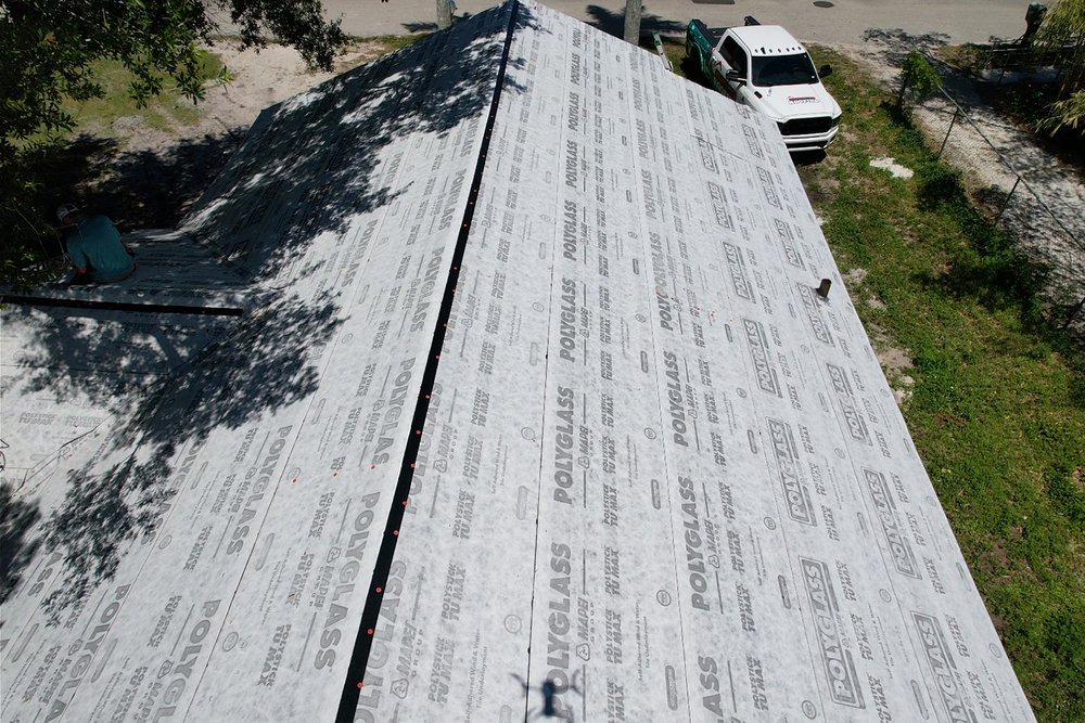 Slide of Mighty Fine Roofing